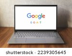 Small photo of Google E-E-A-T on laptop screen on desk. Quality Rater Guidelines update. Experience added. Warsaw, Poland - December 17, 2022.