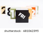 Small photo of the block shows the number that represents the time elapsed. And the word "FRI" refers to the last working day of the week everyone is waiting. On white background.