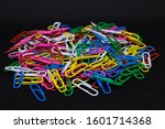 Paper clips of various colors.