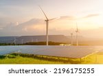 Small photo of Sustainable energy. Solar and wind turbines farm. Sustainable resources. Solar, wind power. Renewable energy. Sustainable development. Photovoltaic panel. Green energy. Alternative electricity source.