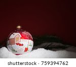 christmas ball lying in the snow | Shutterstock . vector #759394762