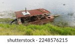 An Old Rusty Boat Stopped And...