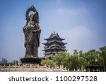 Statue and tower at Guiyuan Buddhist Temple in Wuhan Hubei China