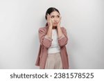 A sad Asian woman employee wears cardigan, looks stressed and depressed, isolated white background.