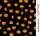 seamless halloween pattern with ... | Shutterstock .eps vector #712877002
