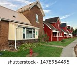 Small photo of Haydenville, Ohio, USA; August 2019: Brick uniform company houses in old brick manufacturing town