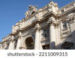 Small photo of Italy -Rome – May 11, 2022: the Trevi Fountain is the largest and most famous fountain in Rome. Details of allegorical sculpture “Salubrity” by Filippo Valle Beautiful details of the horses.