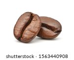 Close-up Two roasted coffee beans isolated on white background. Clipping path