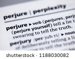 Small photo of Close up to the dictionary definition of Perjure