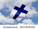 Finland flag isolated on sky...
