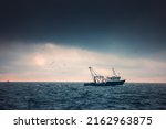 Fishing Boat And Fisherman In...