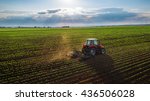 Tractor Cultivating Field At...
