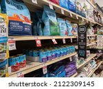 Small photo of Woodinville, WA USA - circa February 2022: Angled view of bagged and canned dog food inside of a Petsmart store.