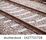 Old rusty vintage railroad track, high constrast, rail transportation concept