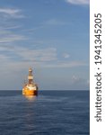 Small photo of Deep Water DP3 classed drill ship at oil field carrying out drilling operation