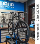 Small photo of Taglio di Po, Italia - 04 09 2023: Pinarello Dogma F 2023 with Shimano Ultegra Di2 and Fulcrum wheels. Thi photo was shot in a italian bike shop near Venice and near Pinarello headquarters.