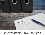Small photo of white paper with the German word Vollmacht means: power of attorney, next sentense means: I hereby authorize, then name, date of birth and address
