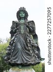 Small photo of Lisbon, Portugal- October 21, 2022: Replica of the Statue of Queen Catherine of Braganza, by Audrey Flack, in the Park of Nations