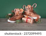 Small photo of Saint Nicholas Day or Nikolaus, german holiday, December 6. Children shoes with traditional sweets.