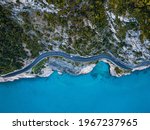 Aerial view of Aurelia street in Noli, Capo Noli and Varigotti, province of Savona. Drone photography from above of snake street snake in Liguria, north Italy, near Bergeggi and Spotorno.