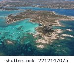 Small photo of Aerial view of La Maddalena Island, Isola Giardinelli with the drone view of Caprera Island in Sardegna, Italy. Birds eye view of crystalline and turquoise water in north Sardinia, luxury yacht, boat.