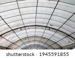 Under large outdoor roof dome construction, canvas and metal for event and parking exhibition.