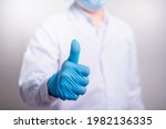doctor showing thumbs up for... | Shutterstock . vector #1982136335