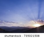 the sun is coming out from... | Shutterstock . vector #735021508