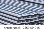 Small photo of Stack of many gray rust proof lip channel steel material in construction site area