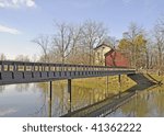 wooden bridge and historical homestead by the lake at 50 Point Stoney Creek, Hamilton Ontario Canada
