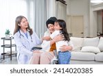 Small photo of Beautiful Asian female doctor and granddaughter giving encouragement and hugging grandmother who get sick or cancer, smiling with happiness, love, warmth. Retirement, Healthcare, Insurance Concept