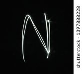 n created by light letters  ... | Shutterstock . vector #1397888228
