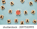 Red dartboard and black arrow connection linkage with human icon for customer focus target group and customer relation management concept.