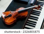 The violin on piano background