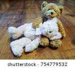Romantic cuddly teddy bears - head on the lap