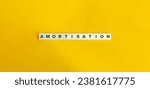 Small photo of Amortisation Word. Economic Term on Letter Tiles on Yellow Background. Minimal Aesthetic.