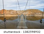 The Star Mine Suspension Bridge is a 117 metre long pedestrian suspension bridge across the Red Deer River in Drumheller, Alberta, Canada. Constructed in 1931,Travel Alberta