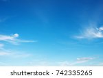 Blue Sky Background With White...