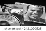 Small photo of Rome, Italy - January 16, 2024: CDs and artworks of Spanish singer, songwriter, composer JULIO IGLESIAS. probably the most commercially successful Spanish singer in the world