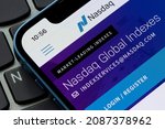 Small photo of Portland, OR, USA - Dec 3, 2021: Closeup of the homepage of the Nasdaq website on an iPhone. Nasdaq, Inc. is an American multinational financial services corporation headquartered in New York City.