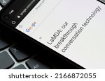 Small photo of Portland, OR, USA - June 12, 2022: An article about LaMDA, published on May 18, 2021, is seen on Google's official blog on a smartphone. A Google engineer claims AI technology LaMDA is sentient.