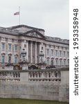 Small photo of City of Westminster, London | UK - 2021.04.10: Buckingham Palace Union Flag flying at half-mast. tribute to Prince Philip