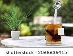 Small photo of In a cup of tea, pour a sugar substitute. Stevia, erythritol.