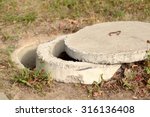 Exposed Concrete Manhole