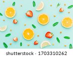 strawberries  slices of orange  ... | Shutterstock . vector #1703310262