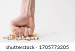 man's fist crushing cigarettes... | Shutterstock . vector #1705773205