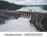 Small photo of Aerial view of water discharge at hydroelectric power plant