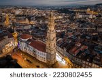 Small photo of Aerial view of the 18th-century Clerigos Tower (Portuguese: Torre dos Clerigos) and Porto cityscape at dusk in Porto (Oporto), Portugal.