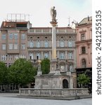 Small photo of Brno, Czechia, Europe - April, 26th, 2023 - Plague Column or Marian Column at Freedom Square (Baroque style, built in 1679–1683 to commemorate a large epidemic plague)