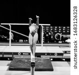 Small photo of MELBOURNE, AUSTRALIA - 22 FEBRUARY, 2020: World Cup Gymnastics, Melbourne 2020 Finals, Women's Balance Beam (BB) Emma Nedov (AUS) from Australia, Back Handspring Take off in black and white
